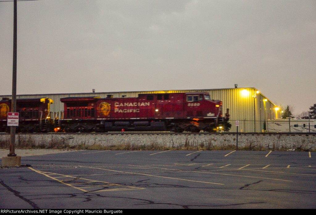 CP AC44CW Locomotive leading a train